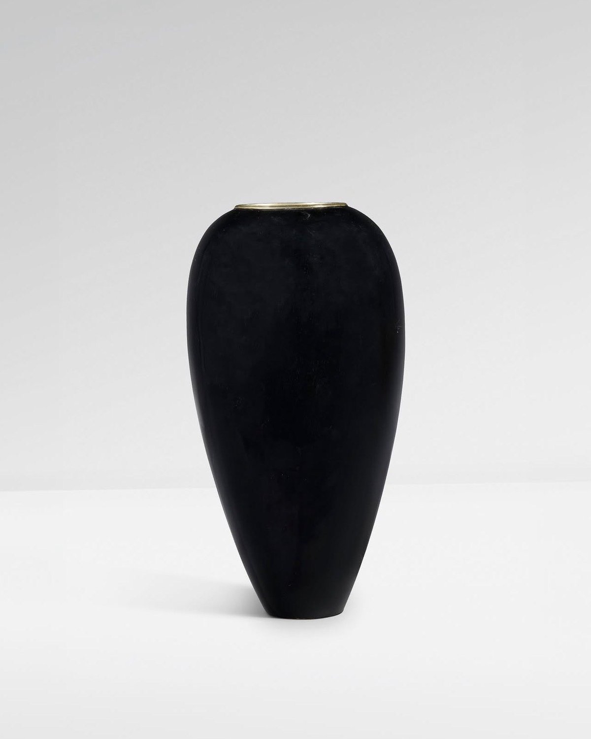 Black lacquered vase with a silvered rim